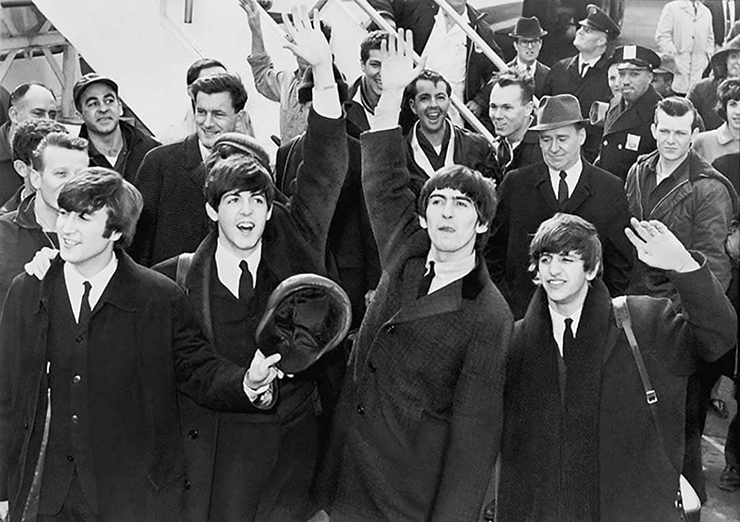 The Beatles arriving at the John F. Kennedy International Airport, New York, USA (1964)