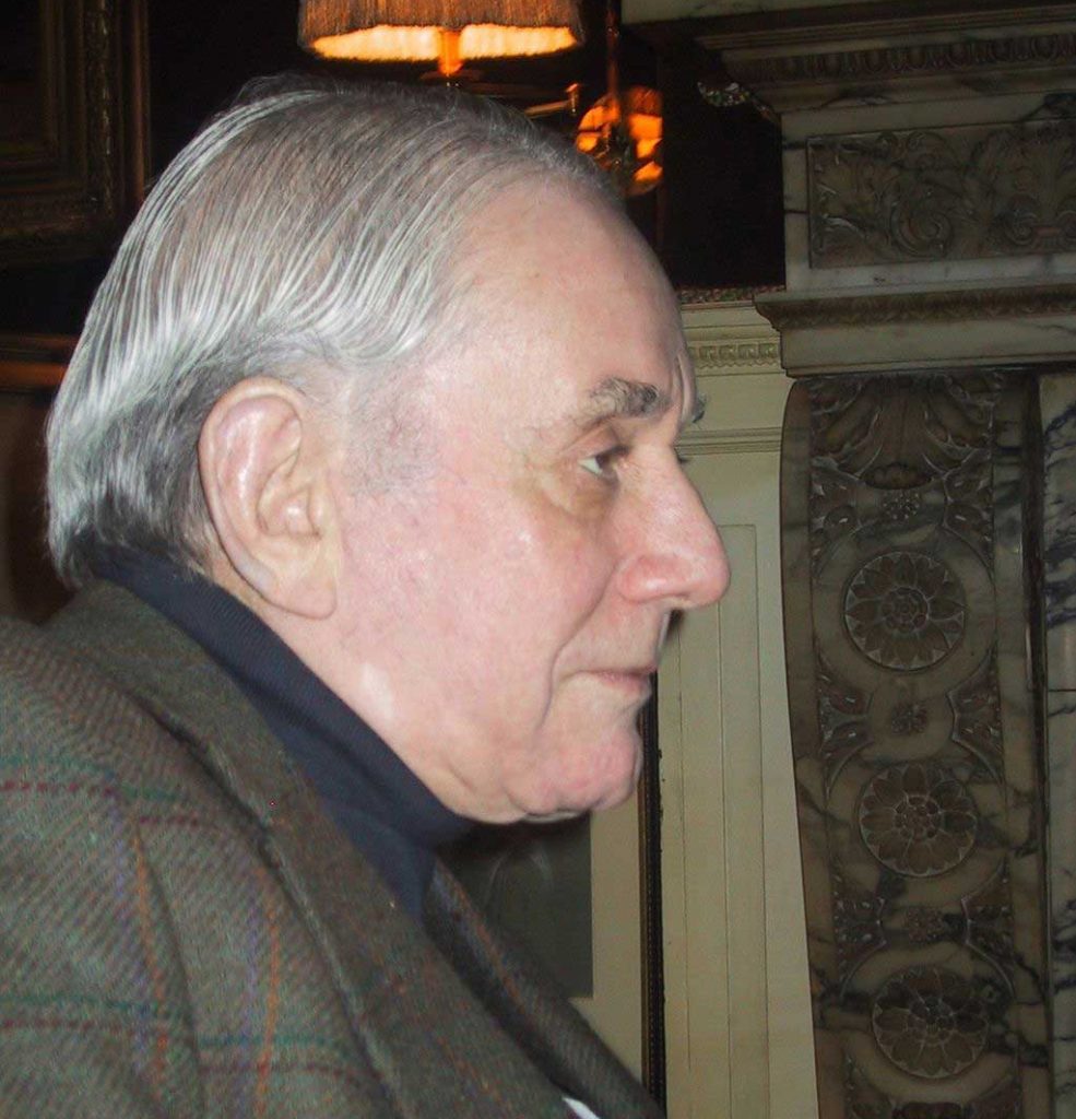 Kenneth Jay Lane in his apartment in New York City in 2003