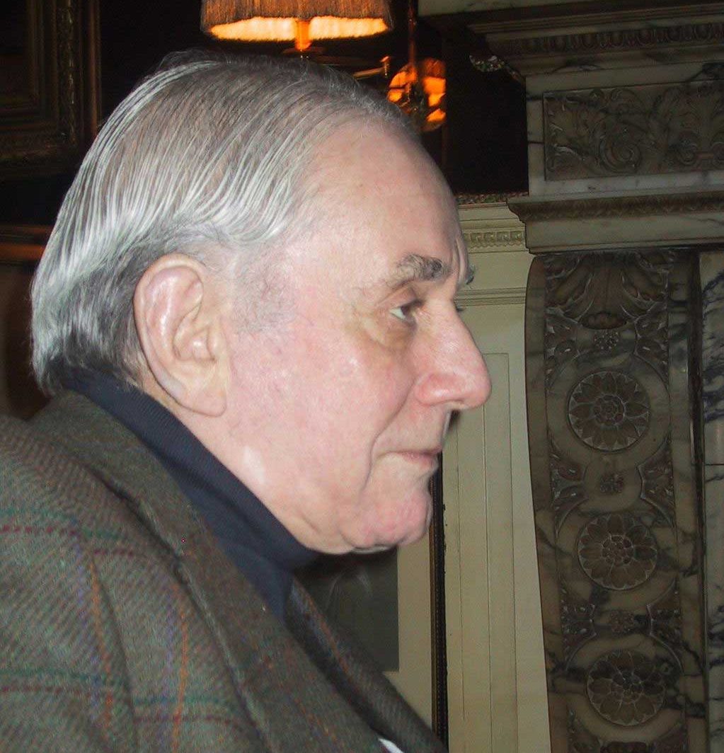 Kenneth Jay Lane in his apartment in New York City in 2003