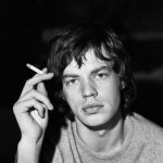 Mick Jagger portrait holding a cigarette in 1965