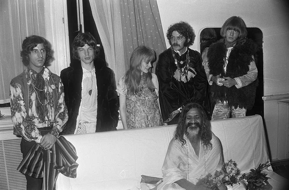 From left to right: Michael Cooper, Mick Jagger, Marianne Faithfull, Shepard Sherbell, Maharishi Mahesh Yogi, and Brian Jones at the Royal Concertgebouw on 1 September 1967