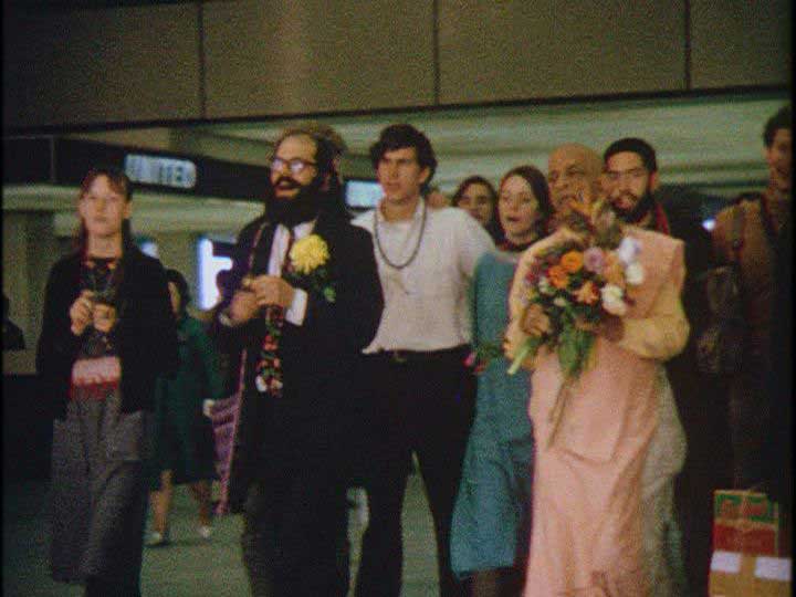 Allen Ginsberg greeting A. C. Bhaktivedanta Swami Prabhupada at San Francisco International Airport (1967)