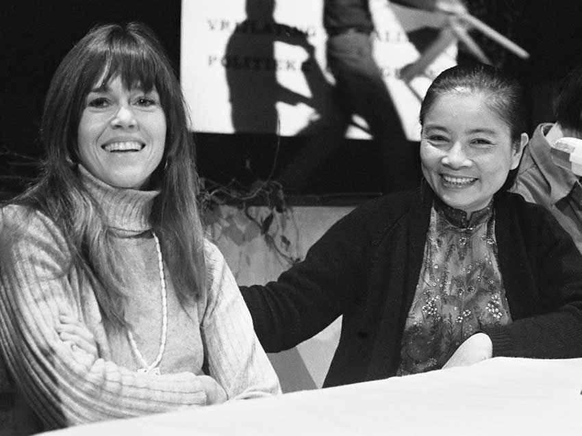 Jane Fonda (left) and Pham Thi Minh (right) at a anti-Vietnam war manifestation in 1975