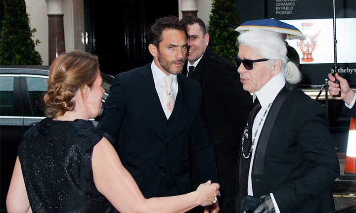 Karl Lagerfeld (right) at the Fendi store opening (2014)