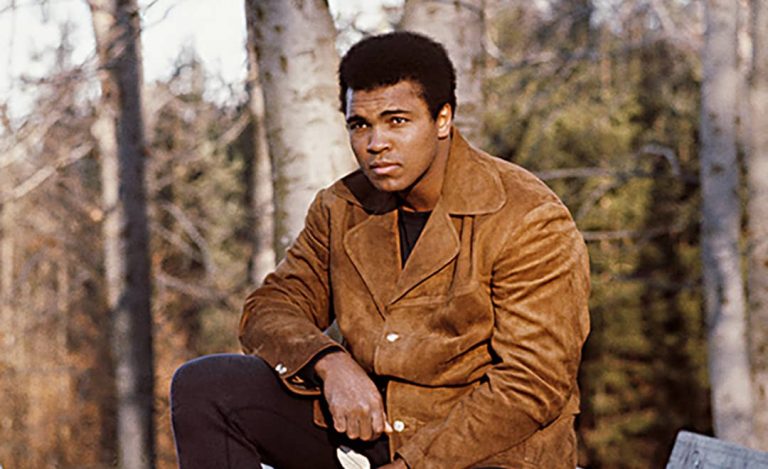 Muhammad Ali sitting on a bench in the Zürich woods, Switzerland (1971)