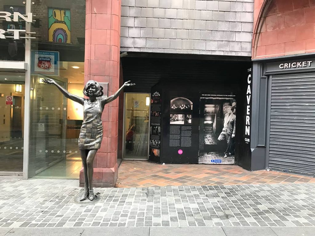 A statue of Cilla Black in front of the original entrance to the Cavern Club