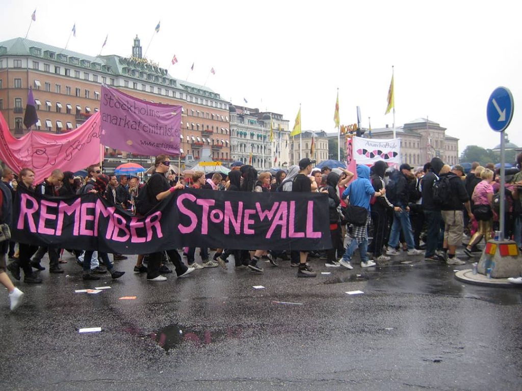 Queer anarchists at Stockholm pride with banner reading "Remember Stonewall" (2008)