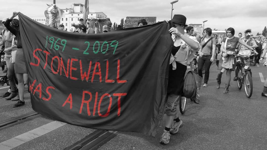 Banner reading "Stonewall was a riot" pictured during Berlin Pride (2009)