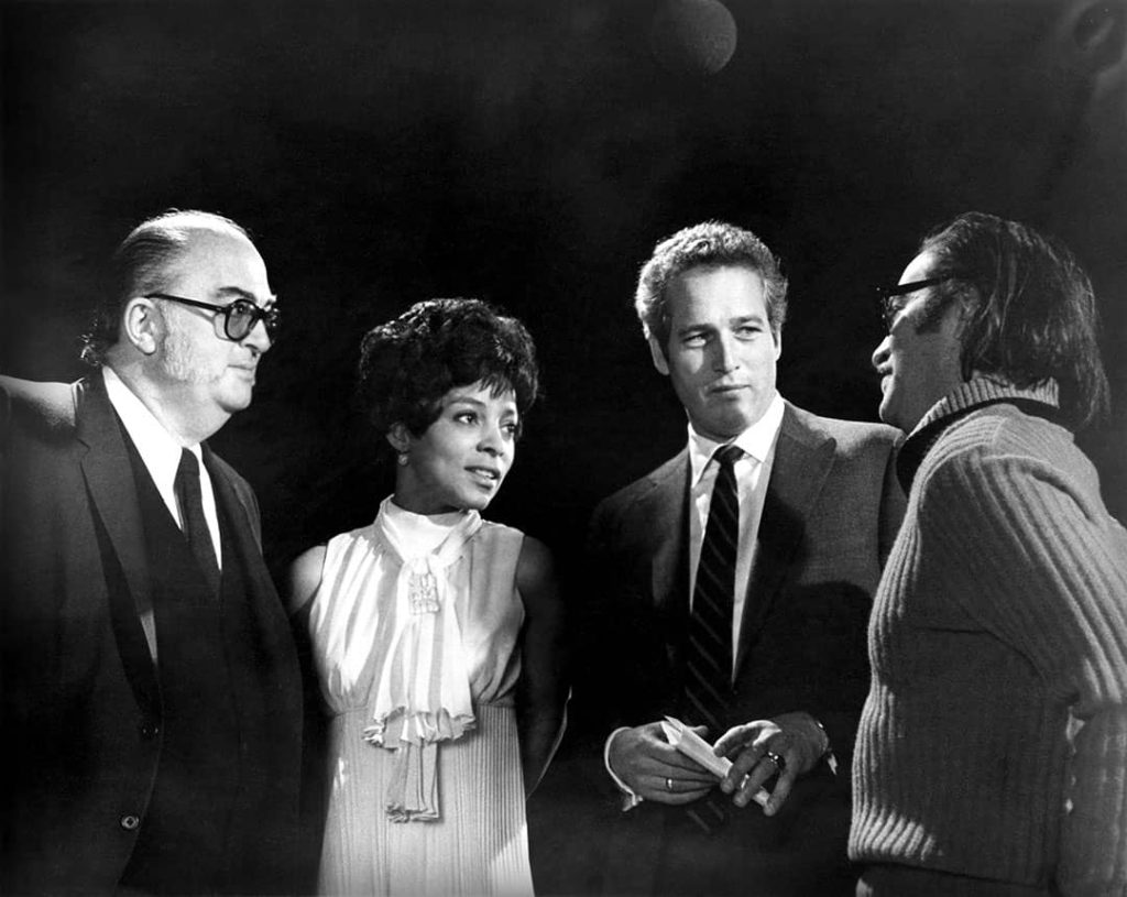 Publicity photo for the American documentary film "King: A Filmed Record... Montgomery to Memphis". From left to right: producer Ely Landau, actress Ruby Dee, actor Paul Newman, and director Sidney Lumet (1970)
