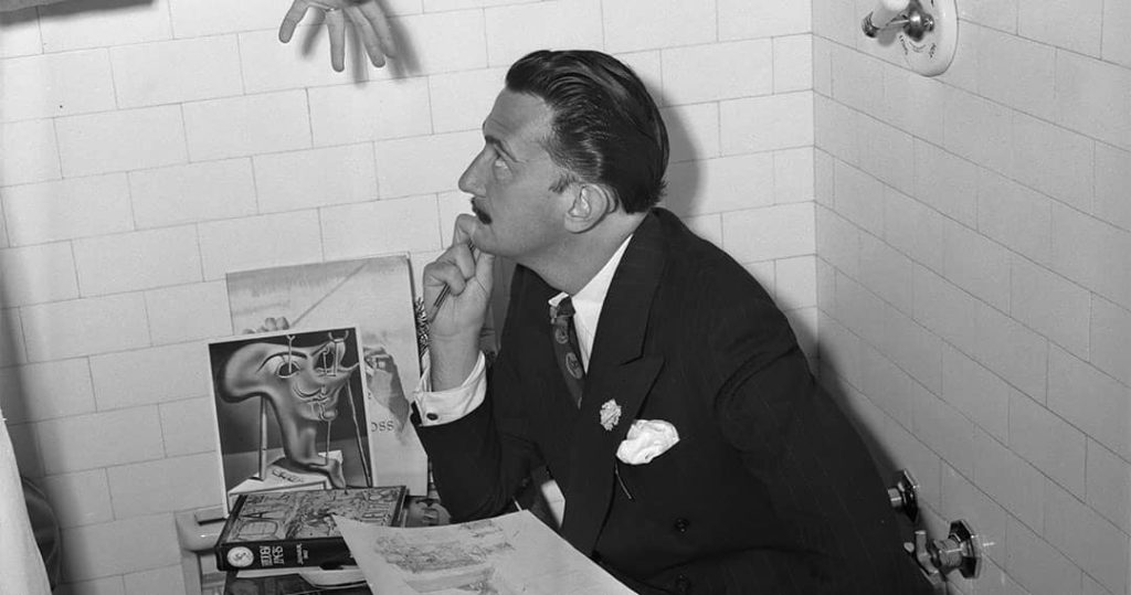 Salvador Dali seated in a bathtub at the Ambassador Hotel in Los Angeles, California, USA (1944)