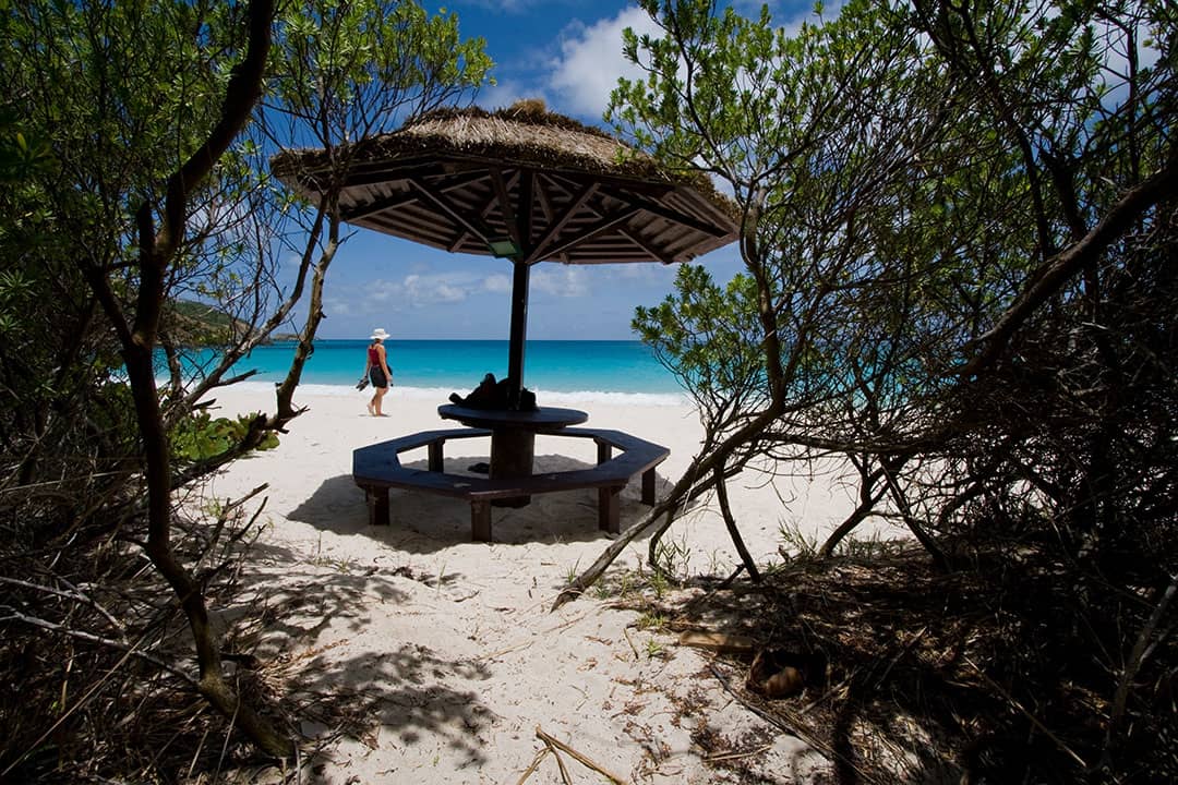 Picnic table on the sands of Macaroni Beach, Mustique Island, Saint Vincent and the Grenadines (2008)