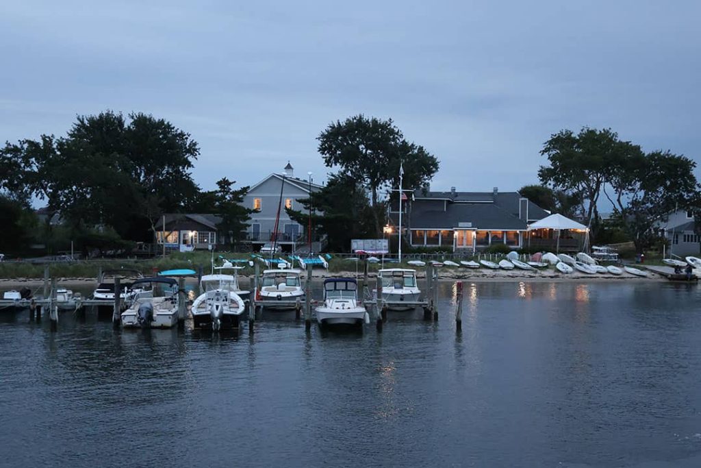 View of Saltaire's harbour on arrival on the Fire Island ferry at dusk, Long Island, New York, USA (2023)