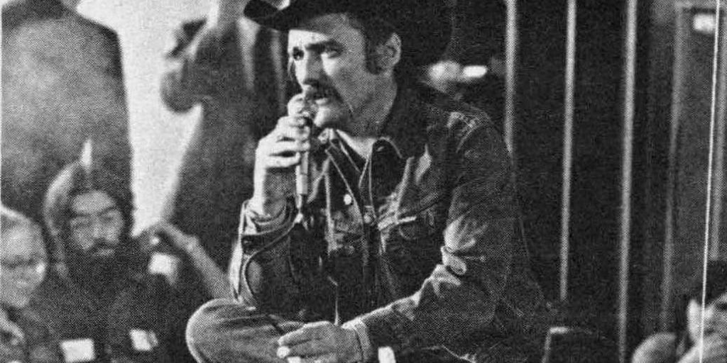 Portrait of Dennis Hopper giving a speech (1973)