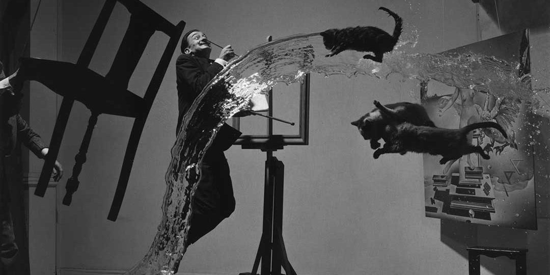 "Dalí Atomicus" is an art piece exploring the idea of suspension, depicting three cats flying, water thrown from a bucket, an easel, a footstool and Salvador Dalí all seemingly suspended in mid-air (1948)