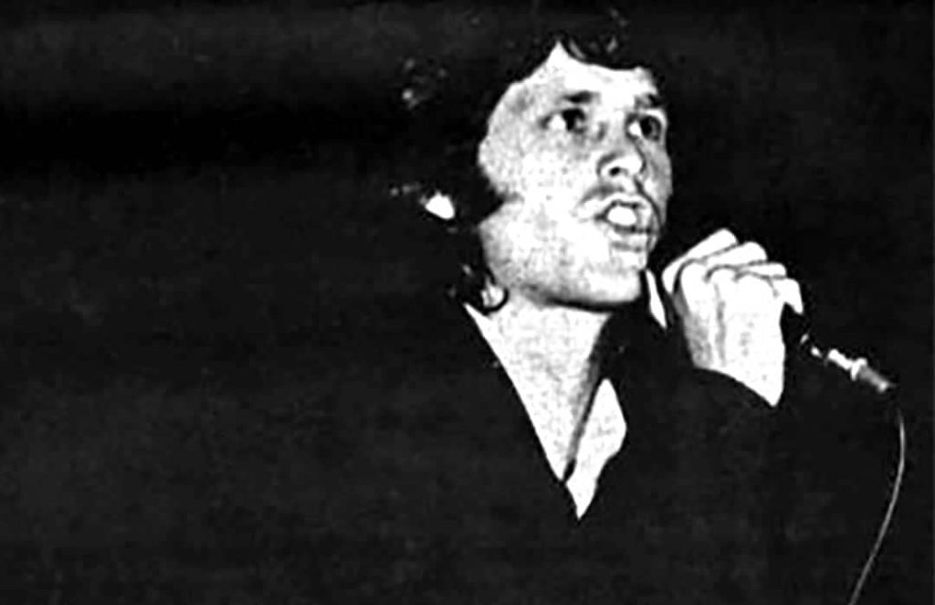 Photograph of Jim Morrison of The Doors performing extracted from the publication KRLA Beat. The paper was produced by KRLA Radio in Los Angeles, California, USA (1967)