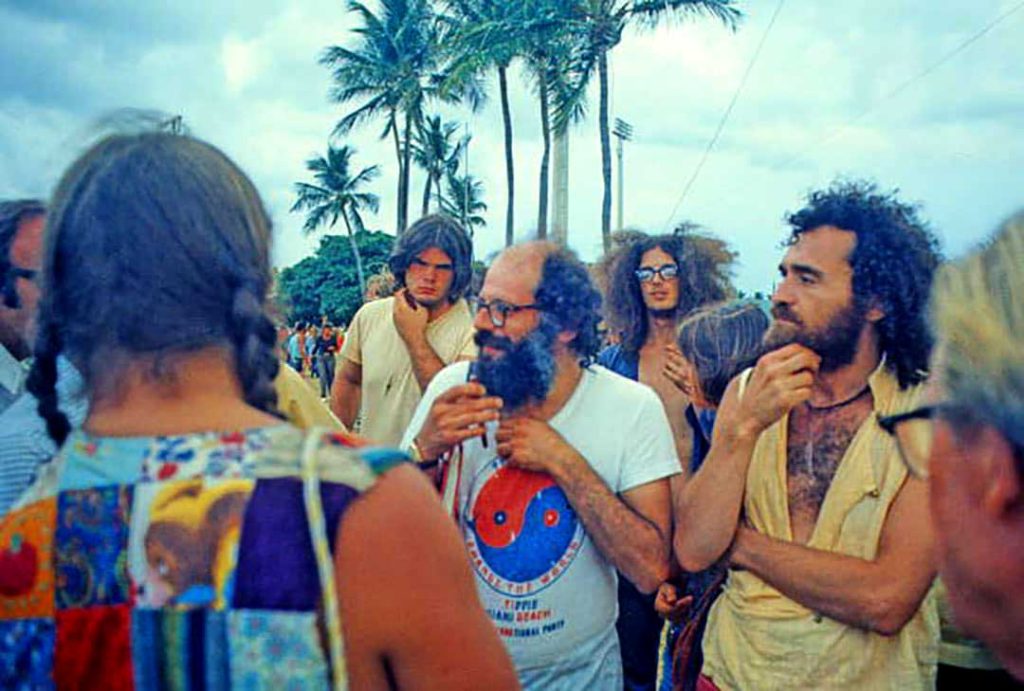 Allen Ginsberg conversing with the protestors at the Vietnam anti-war protest on Miami Beach, Florida (1972)